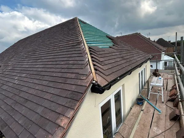 Hip roof replacement in progress